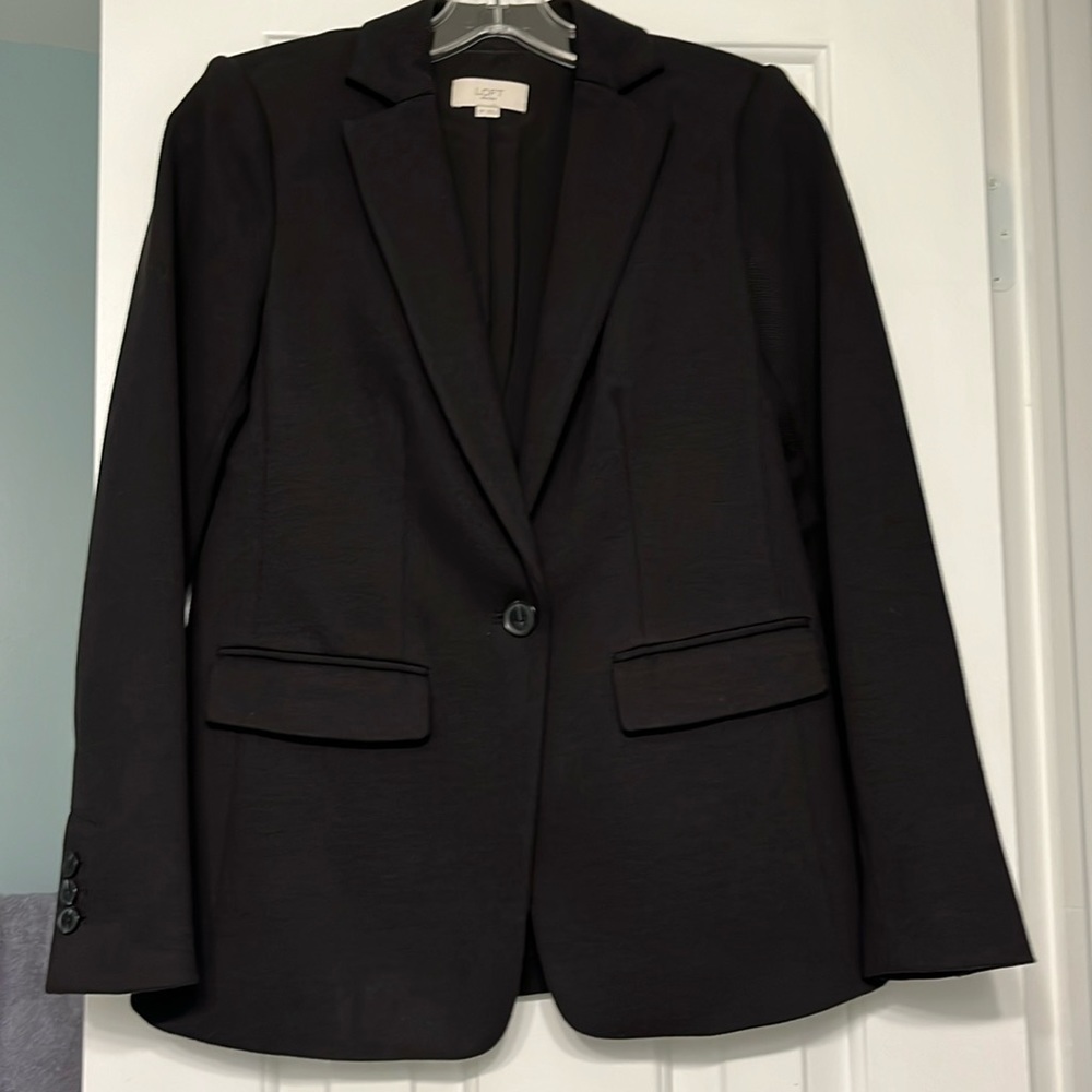 Black blazer 0 petite warm once. A little too big for me.